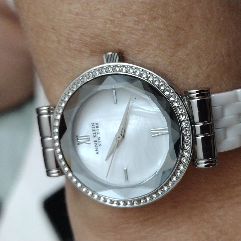 Anne Klein with MOP Face, Ceramic Band,Accented By Crystals.